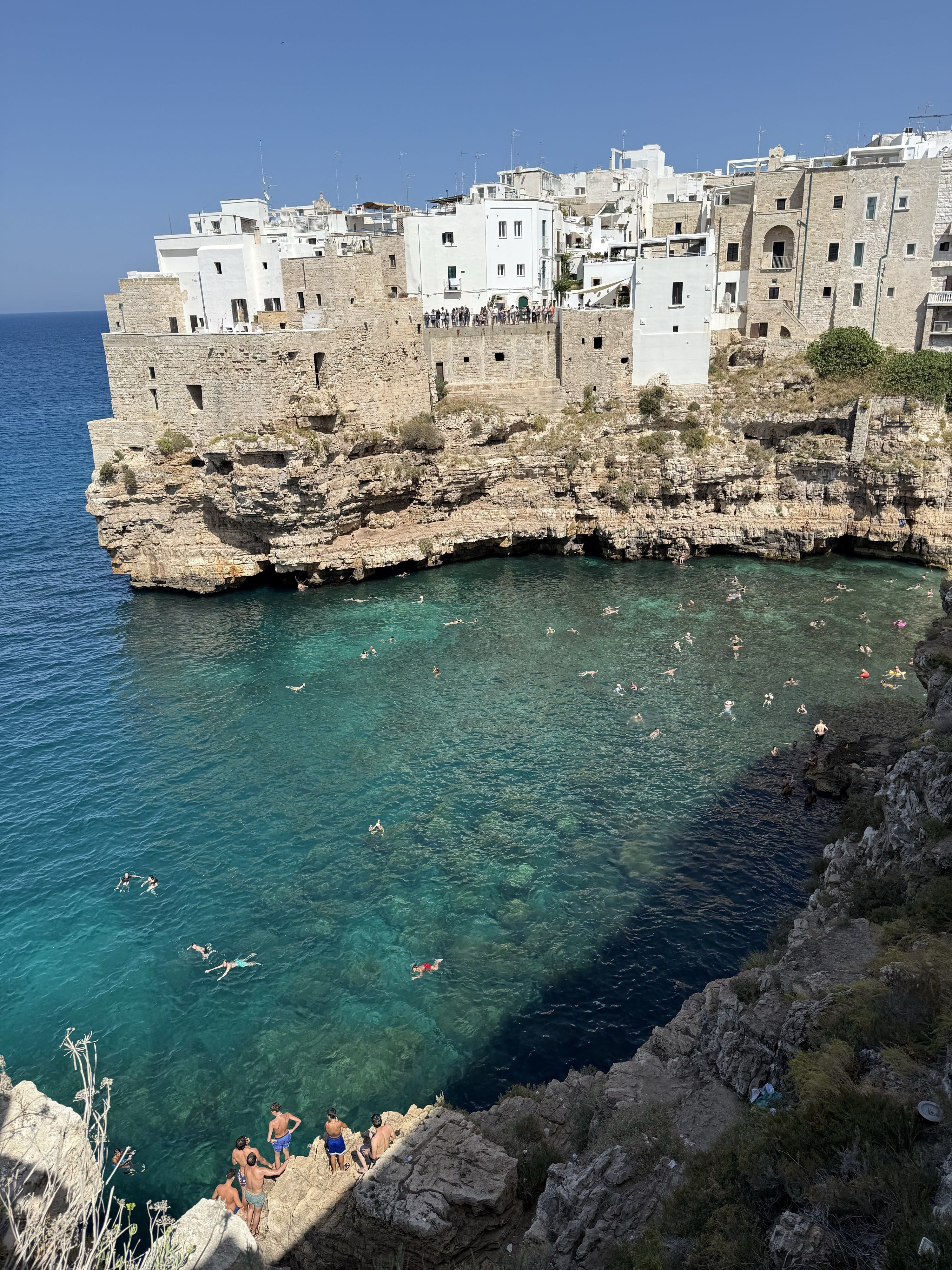 The turquoise cove at Polignano a Mare on the southern Italian coast